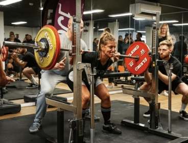 Image of female weight lifting