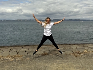 Fundraiser doing a star jump
